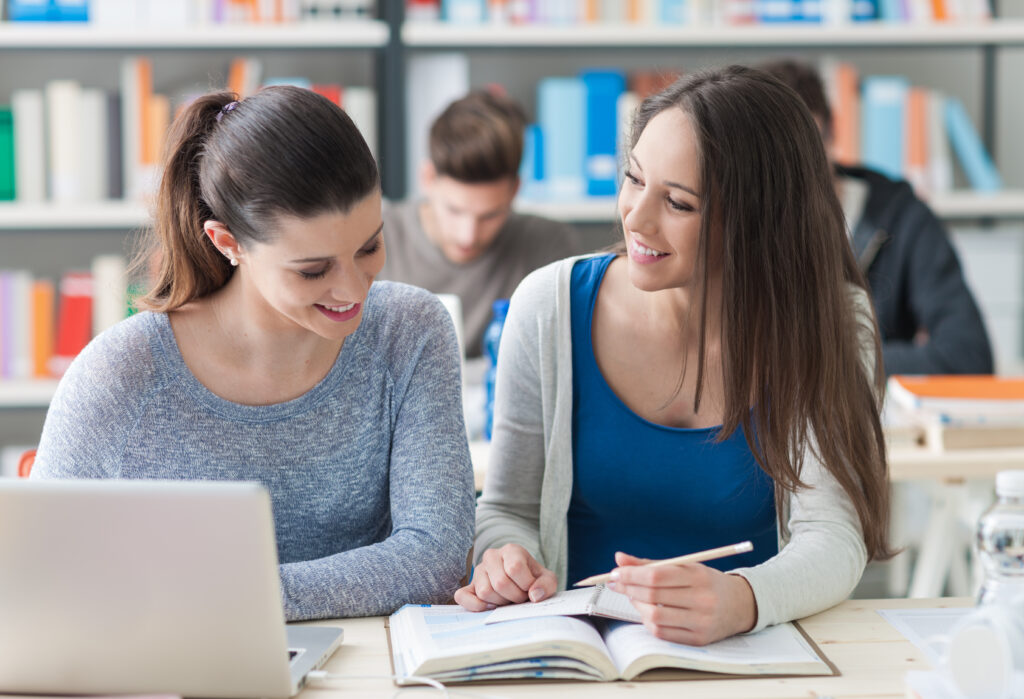 Young college students studying together
